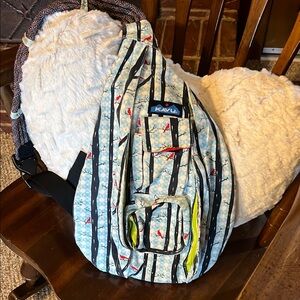 Kavu Blue and Black Backpack with cardinal design